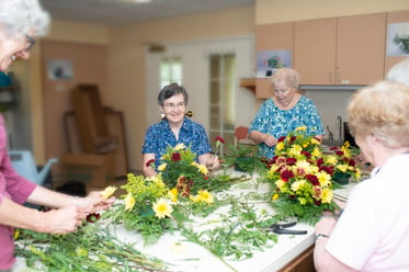 Ladies arranging flowers