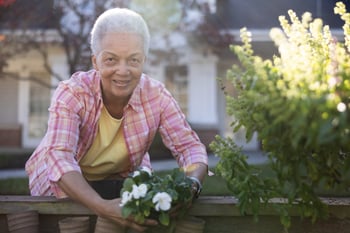 Resident planting flowers