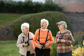 Residents smiling with binoculars 