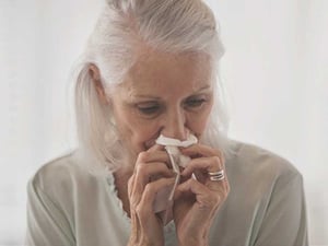 female_senior_blowing_nose-732x549-thumbnail