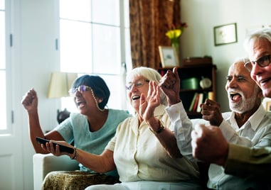 senior-people-watching-televison-together