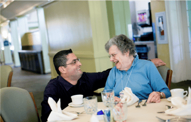 Resident talking with teammember